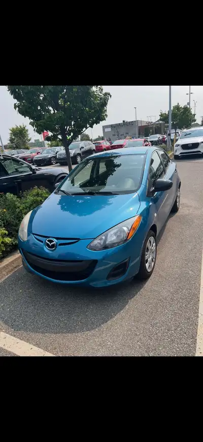 Je vends ma Mazda 2 d'occasion, une voiture fiable et économique, parfaite pour la ville. Avec son s...