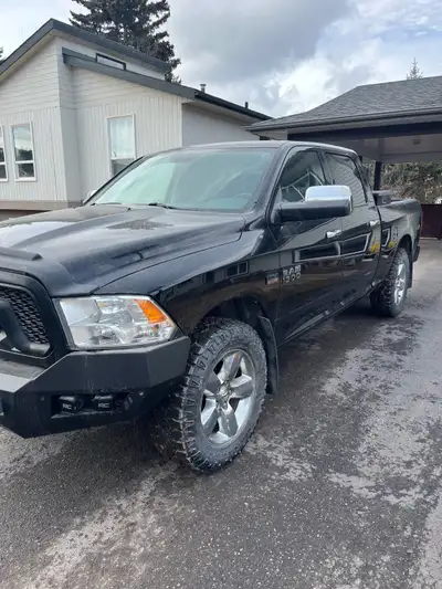 2014 Ram 1500 Crew Cab 6’ 4” box 5.71 Hemi 35 x 12.5 Grapplers on 18” Rims - 85% tread Comes with du...
