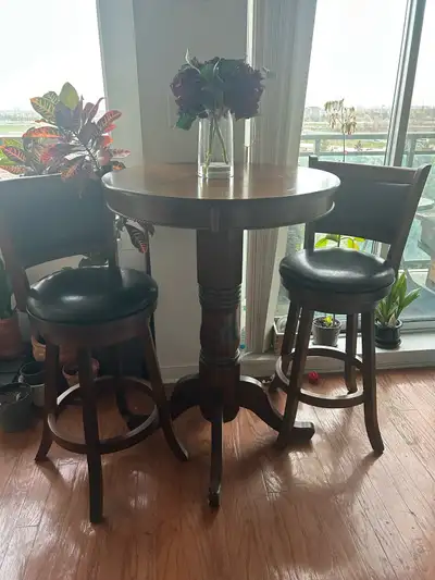 solid wood bar table and swivel stools, View more