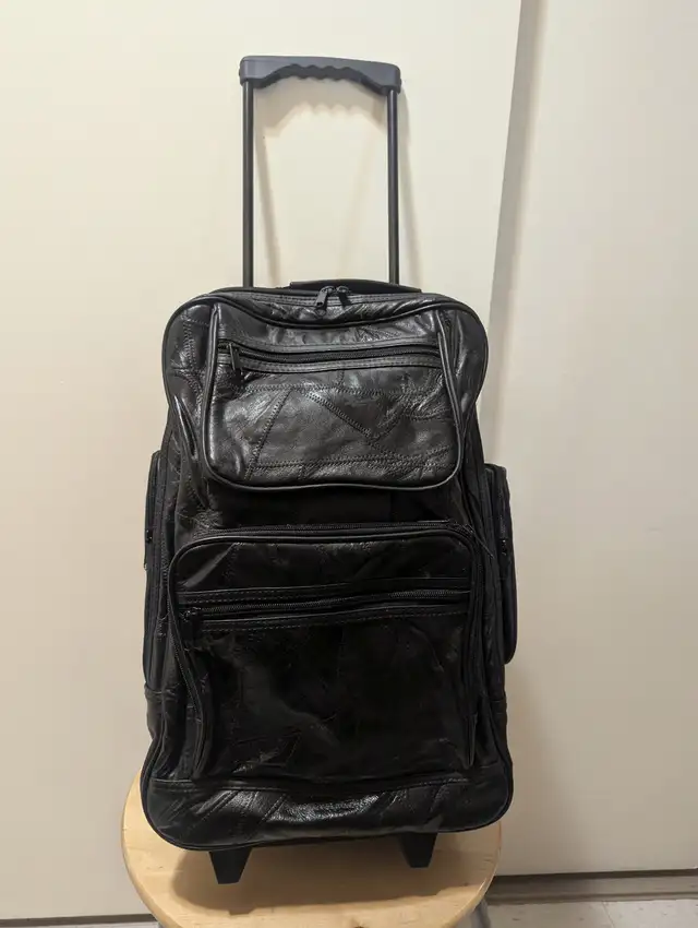 Leather backpack with wheels