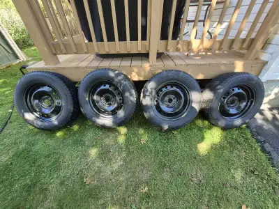 18 inch winter rims and Bridgestone Blizzak tires (235/65R18) with TPMS pressure sensors for sale. I...