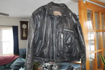 For Sale Men Heavy Leather Jacket.. Size XL.. All Snaps & Zippers work .. In Excellent Shape.. Note...