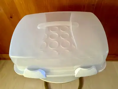Like new large Wilton cake, cupcake, and baking carrier/keeper. $12 for one. Two available for sale....