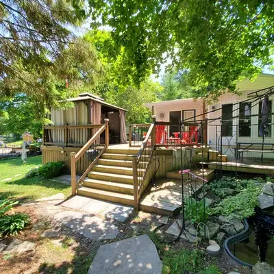 Asking 199,900 (188,900 plus 11,000 two year lease). Beautiful double wide park model trailer on a d...