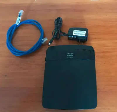 Cisco Linksys E1500 4-Port 300MB Wireless Router with Power Cord. Used, in good working condition