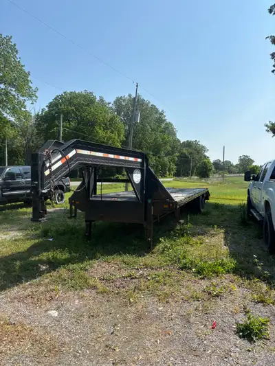 25’ of flat deck Ramps and center section make it 30 total feet of flat deck if needed for cargo 12,...