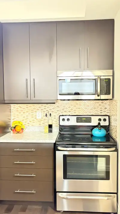 Sleek Frigidaire Stainless Steel Kitchen Set - Range & Microwave, View more