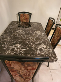 Marble look glass dining table for sale.