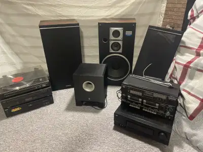 JVC amp 155 watt with remote Sanyo cassette player And turn table 2 DVD players 2 Sanyo 100 watt spe...