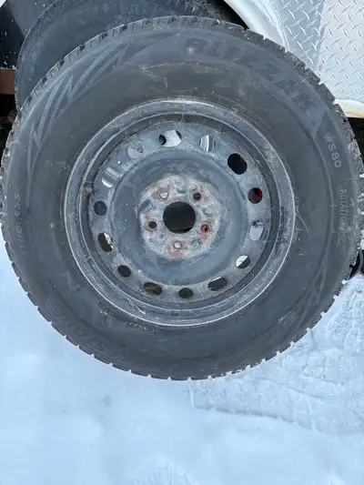Set of 4 Bridgestone blizzak winter tires and rims. 235/65/16 decent tread left. Came off a 2009 rav...