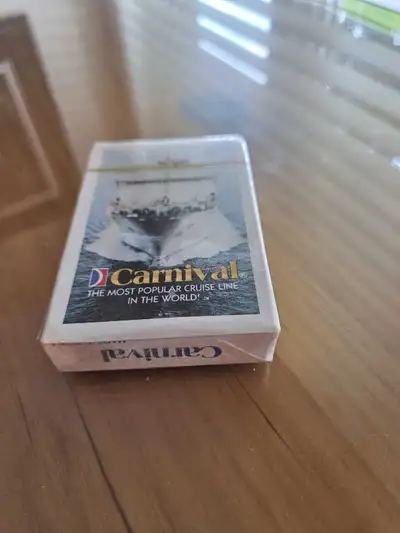 Offering a brand new, sealed deck of playing cards from Carnival Cruise Line, perfect for collectors...