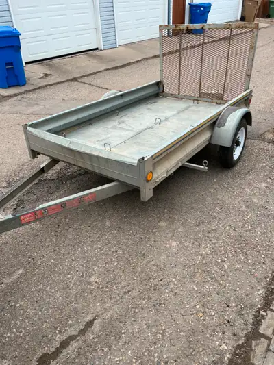 Used 4’x8’ flatbed utility trailer with rear drop ramp. Trailer is galvanized steel and extremely li...