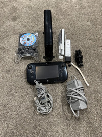 Nintendo wii u with 2 controllers nunchuck and games