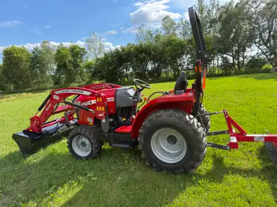 Mint Condition Massey Ferguson MF1825E Tractor This Tractor was bought brand new from DanR Equipment...