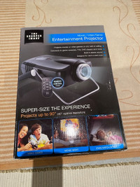 THE SHARPER IMAGE ENTERTAINMENT PORTABLE MEDIA PROJECTOR EC-PJ10