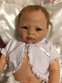 Baby Doll with COA and Wicker Basket