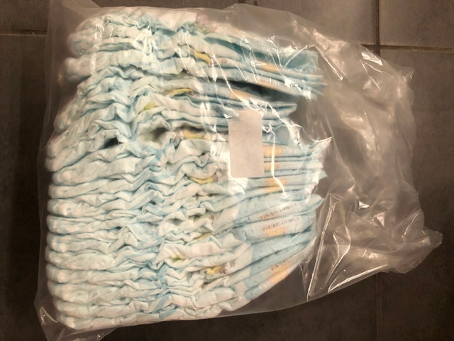 PAMPERS Diapers and Easy ups / Pull ups plus portable change pad