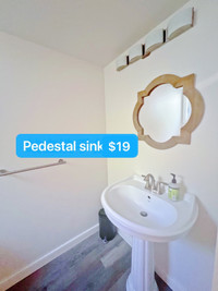 Pedestal sink white bathroom 