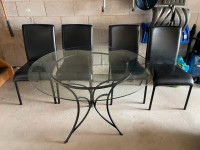 Pier1 tempered glass round kitchen table plus four chairs