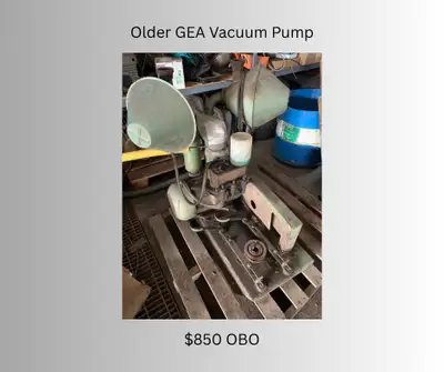 Older GEA Vacuum pump on stand complete with oil retainers
