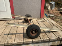 Dolly and axle mounted on T-style metal frame $20