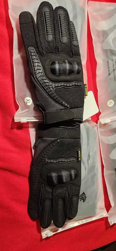 I am selling a pair of brand new Moto riding gloves with great padding, perfect for motorcycle enthu...