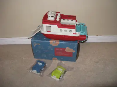 All aboard! This floating toy boat comes equipped with two toy cars, help everyone on board by slidi...