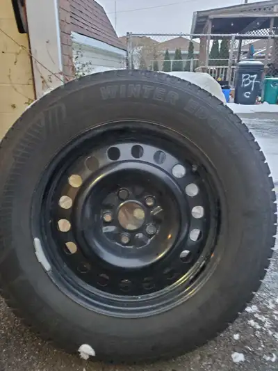 Like new. Set of 4. Snow tires and rims off a 2017 Chevy Equinox. Only 100 km on them. Motomaster Wi...