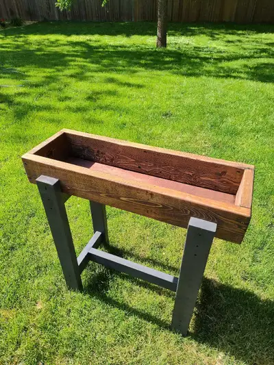 Porch planter for your yard, deck or porch. Handmade with reclaimed lumber. Charcoal painted legs an...
