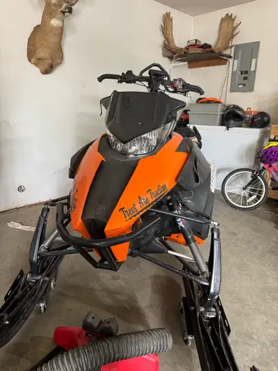 2012 Arctic cat m800 runs great, has upgrades. Has cover. Sled deck lightly used 10’ ramp 7’ deck.