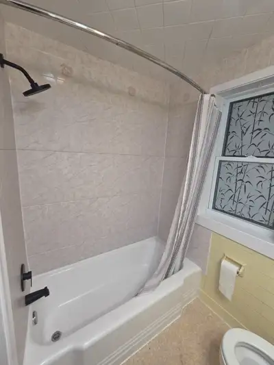 Bright and cozy 2-bedroom house for rent in the heart of Fairview, Halifax, featuring a private yard...