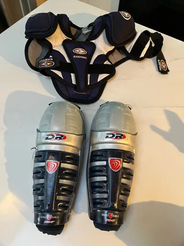 Hockey kids shoulder pads (Y Small) and shin pads (10”) in Hockey in Calgary - Image 2