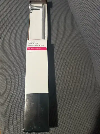 NEW: Delta Trinsic 24-inch Wall Mount Bathroom Towel Bar in Chrome. Extends 3 1/2 inch from wall Til...