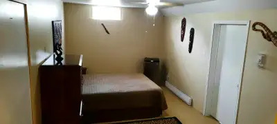 June 1st Large Furnished Room for rent in quiet very clean townhouse in basement. $725.00 per month...