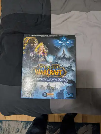 Embark on an epic adventure with the World of Warcraft: Wrath of the Lich King Pandemic System board...