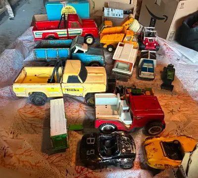 Description There are 13 Vintage Toy vehicles and 1 AJ Foyt Driver Doll. The ultimate collection for...