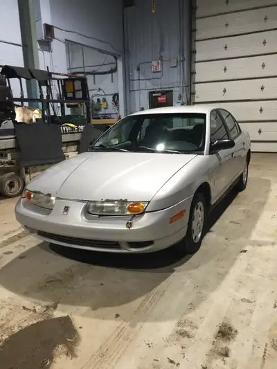 We've dropped the price from $3000 to $2800. Don't diminish the value of our 2000 Saturn by the mile...
