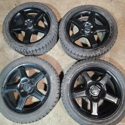selling four 17 Inch Yokohama winter tires with black alloy rims for $800. 90% of tread remaining. t...