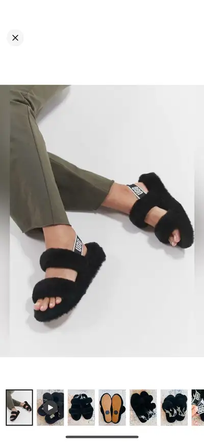 Plush faux-shearling upper with twin straps. Elastic branded heel strap for secure fit. Soft cushion...