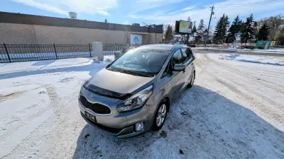 Selling my 2014 Kia Rondo LX, a fuel-efficient hatchback that comes with a 4-cylinder engine and a a...