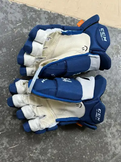 Maple Leafs Auston Matthews  game worn gloves, View more