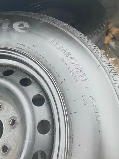 Basically brand new. Firestone transforce ht Lt245/70-17. On 6bolt Chev rims