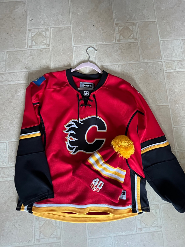 Women’s XL Calgary Flames jersey + toque  in Women's - Tops & Outerwear in Calgary