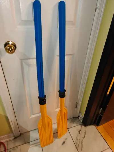 Two hard plastic paddles for inflatable boats. 45.5 inches long. Pickup at Tesson place, near 401/Po...