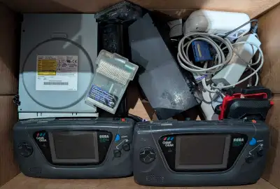 Selling a lot of Electronics AS IS for Parts or Repair. Contains Sega Game Gear, Nintendo Cables and...