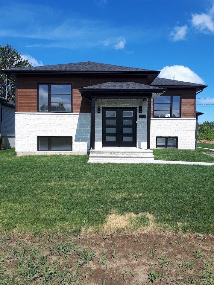 Maison avec Bachelor 3 1/2 au sous-sol (revenu) — photo 1