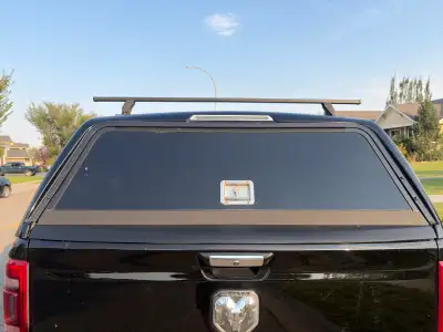 LEER 100RCC. Retails for $6,000. Rugged cab-high reinforced fiberglass canopy. Features built-in loc...