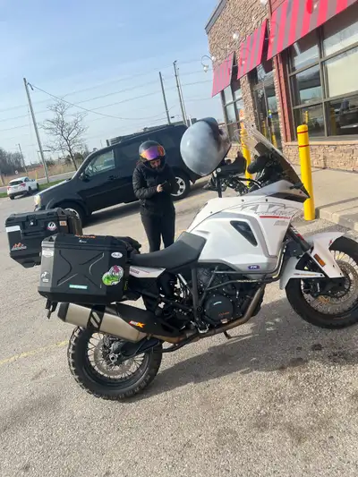 I'm selling my KTM Adventure motorcycle, known for its robust performance and versatility both on an...