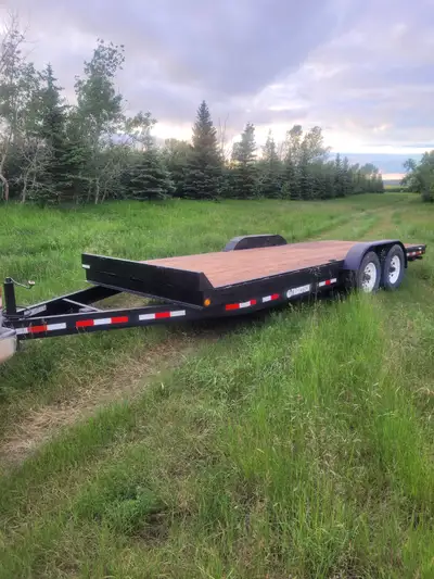 Totally redone, new treated planks, new fenders,lights, elec. Brakes, 7000 lb axles, 16000lb GVWR. S...