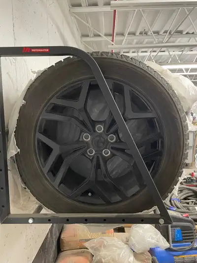 Used for two seasons, might as well be new on actual range rover blacked out aluminum rims Tires are...